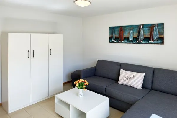 Wohnzimmer in der Ferienwohnung Üüs Aran 4 in Süddorf auf Amrum Haus *Üüs Aran* Ferienwohnung *Üüs Aran 4*