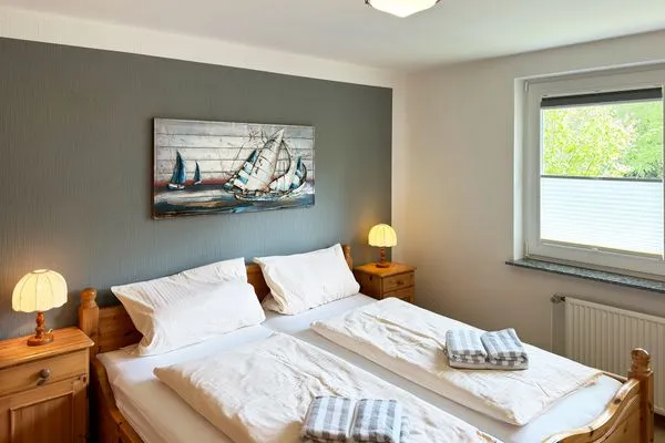 Schlafzimmer in der Ferienwohnung Üüs Aran 4 in Süddorf auf Amrum Haus *Üüs Aran* Ferienwohnung *Üüs Aran 4*