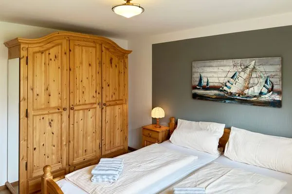 Schlafzimmer in der Ferienwohnung Üüs Aran 4 in Süddorf auf Amrum Haus *Üüs Aran* Ferienwohnung *Üüs Aran 4*