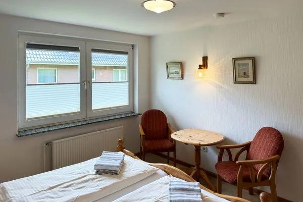 Schlafzimmer in der Ferienwohnung Üüs Aran 4 in Süddorf auf Amrum Haus *Üüs Aran* Ferienwohnung *Üüs Aran 4*