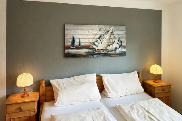 Schlafzimmer in der Ferienwohnung Üüs Aran 4 in Süddorf auf Amrum Haus *Üüs Aran* Ferienwohnung *Üüs Aran 4*