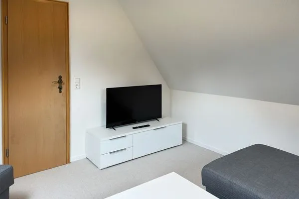 Wohnzimmer in der Ferienwohnung Üüs Aran 6 in Süddorf auf Amrum Haus *Üüs Aran* Ferienwohnung *Üüs Aran 6*
