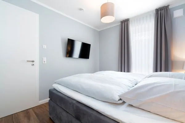 Schlafzimmer Sturmfrei Ferienwohnung "Lounge 2"