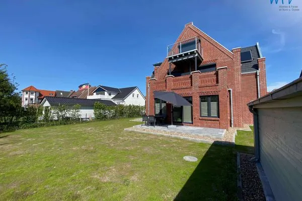 Hauptansicht Haus im Dorfgroden 14 Ferienwohnung Muschelsucher