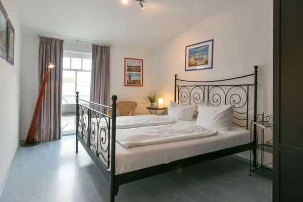 Schlafzimmer Villa Kranich Ferienwohnung 8