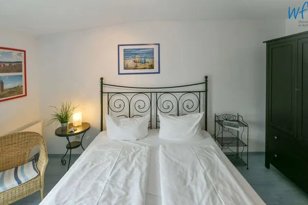 Schlafzimmer Villa Kranich Ferienwohnung 8