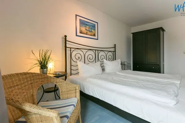 Schlafzimmer Villa Kranich Ferienwohnung 8