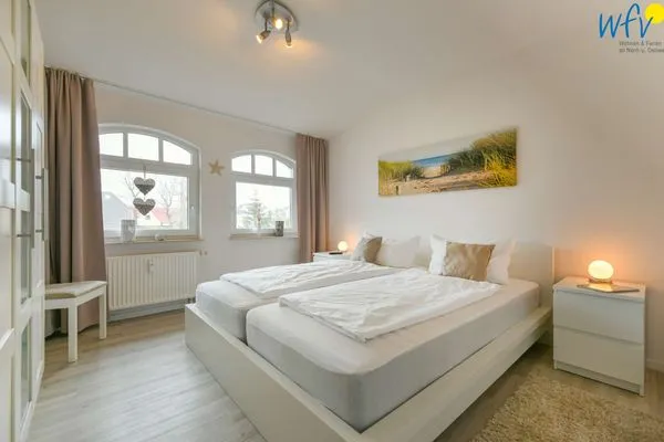 Schlafzimmer Villa Kranich Ferienwohnung 9
