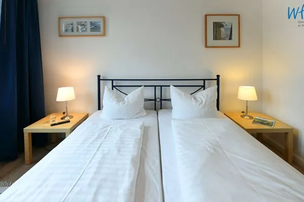 Schlafzimmer Villa Kranich Ferienwohnung 6