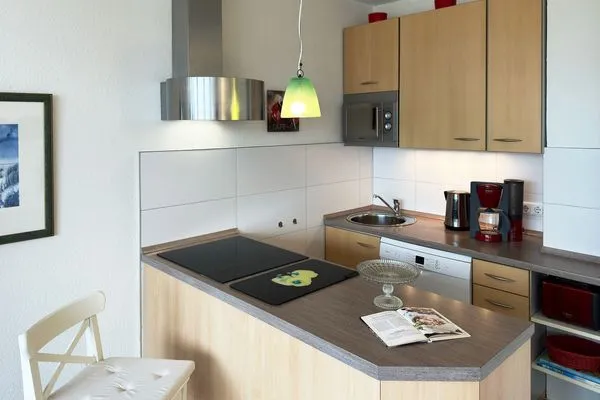 Offene Küche in der Ferienwohnung Watt'n Blick in Wittdün auf Amrum Haus Nordenlicht Ferienwohnung Watt'n Blick