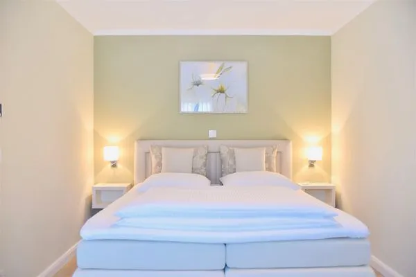 Schlafzimmer mit Doppelbett Logierhaus Friedrich WE 6 - "Strandperle"