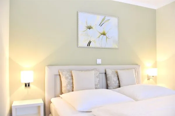 Schlafzimmer mit Doppelbett Logierhaus Friedrich WE 6 - "Strandperle"