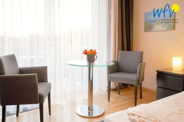 Wohnzimmer Barons Residenz Ferienwohnung 4