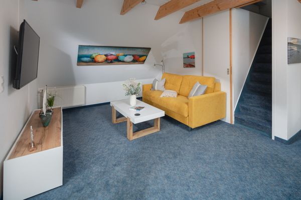  Ferienwohnung Schwalbennest Norderney - Wohnzimmer