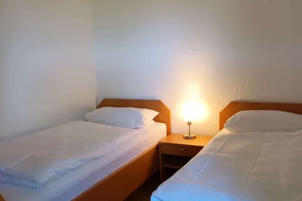 Schlafzimmer Haus Bachstelze Ferienwohnung Lütje Herta