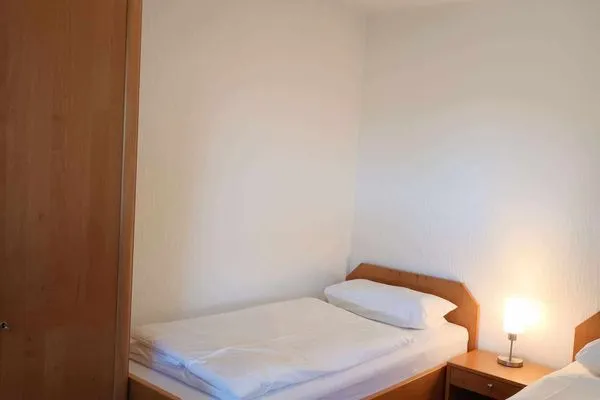 Schlafzimmer Haus Bachstelze Ferienwohnung Lütje Herta