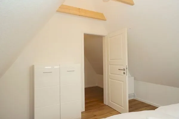 Schlafzimmer  Ferienhaus 'Lütt Huus' für bis zu sechs Personen im historischen Stadtkern von Schleswig