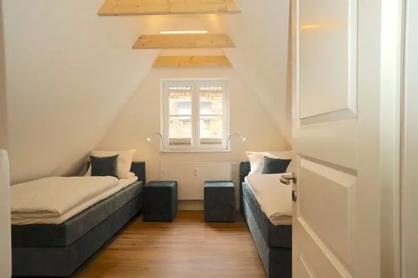 Schlafzimmer  Ferienhaus 'Lütt Huus' für bis zu sechs Personen im historischen Stadtkern von Schleswig