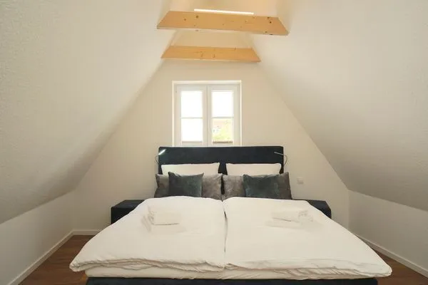 Schlafzimmer  Ferienhaus 'Lütt Huus' für bis zu sechs Personen im historischen Stadtkern von Schleswig