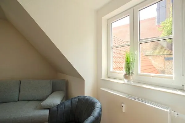 Wohnzimmer  Lichtdurchflutete Ferienwohnung 'Dom-Blick' mit Blick auf den Schleswiger Dom