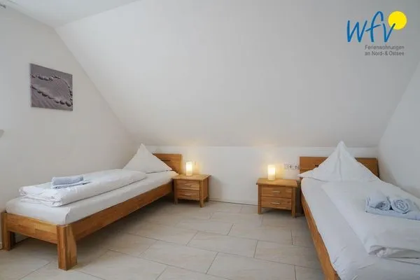 Schlafzimmer Villa Schoen Ferienwohnung 1