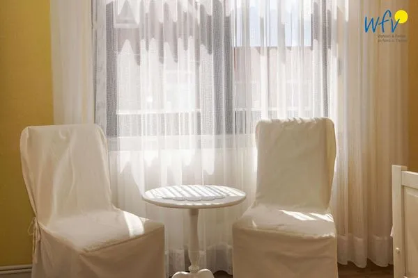 Schlafzimmer Ferienhaus Heidi Ferienwohnung Sandburg