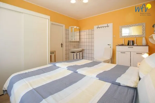 Schlafzimmer Ferienhaus Heidi Ferienwohnung Sandburg