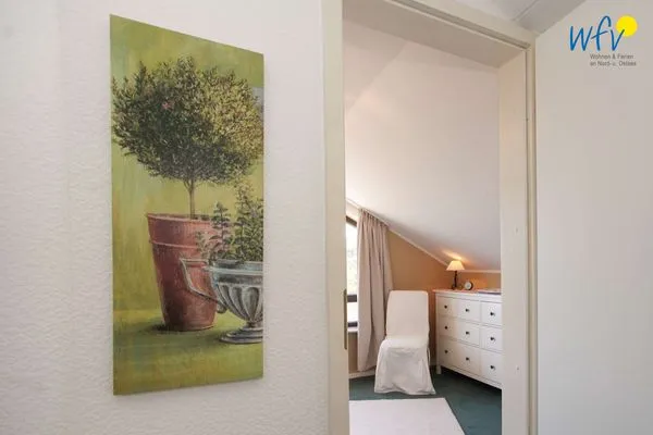Schlafzimmer Ferienhaus Heidi Ferienwohnung Meerblick