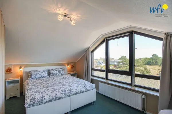 Schlafzimmer Ferienhaus Heidi Ferienwohnung Meerblick