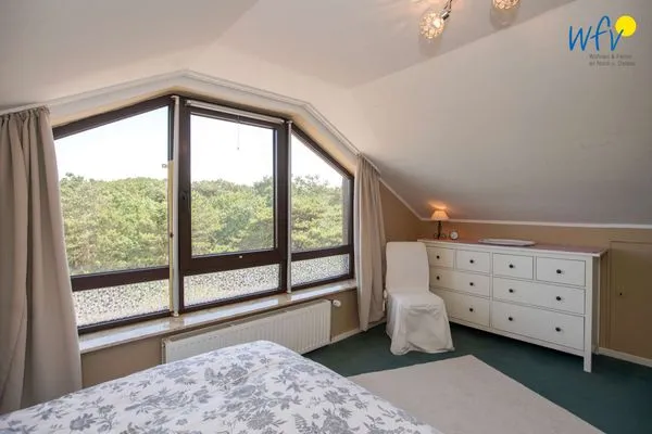 Schlafzimmer Ferienhaus Heidi Ferienwohnung Meerblick