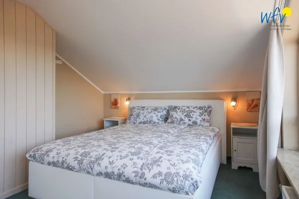 Schlafzimmer Ferienhaus Heidi Ferienwohnung Meerblick