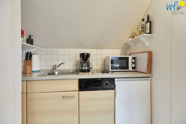 Küche / Küchenzeile Hus Strandloperke Ferienwohnung Seesternchen