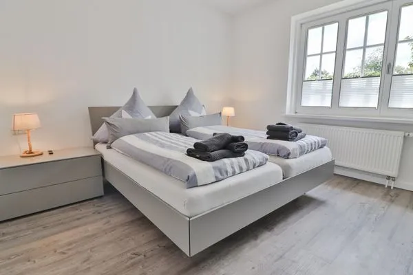 Schlafzimmer  Haus Dünenblume - Wohnung 1