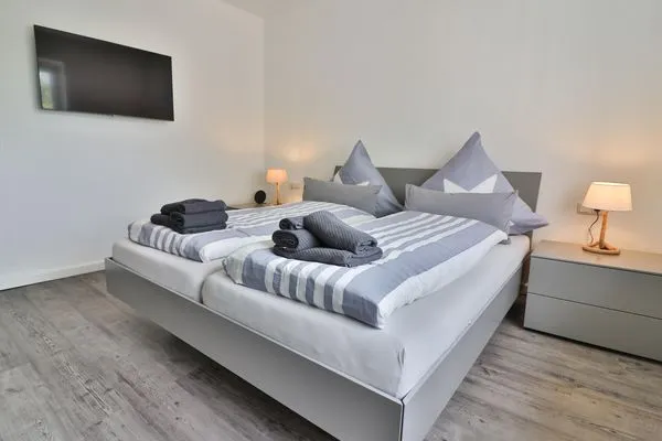 Schlafzimmer  Haus Dünenblume - Wohnung 1