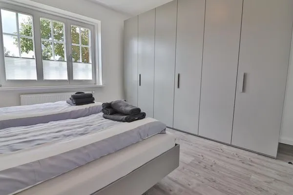 Schlafzimmer  Haus Dünenblume - Wohnung 1