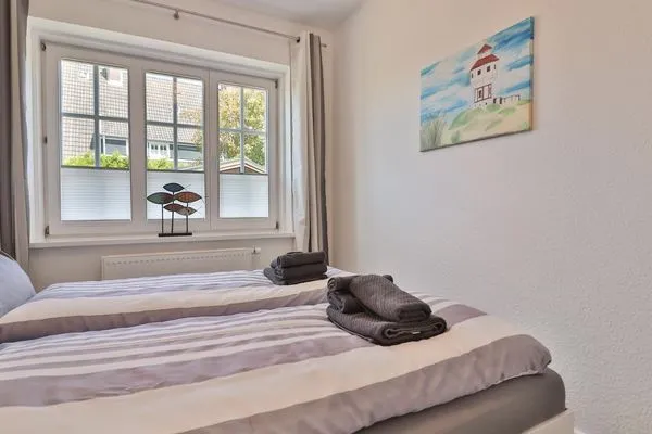 Schlafzimmer  Haus Dünenblume - Wohnung 1