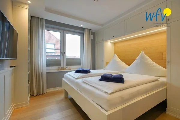 Schlafzimmer Achterhus Ferienwohnung Wattwurm