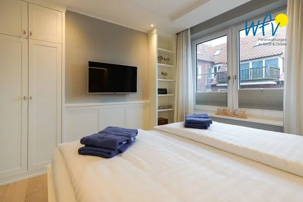 Schlafzimmer Achterhus Ferienwohnung Wattwurm