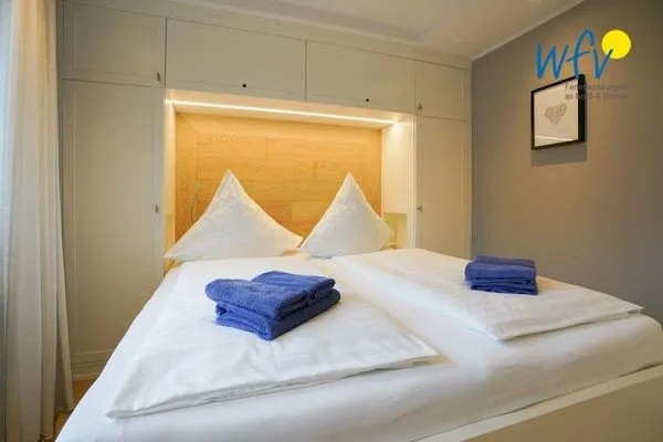 Schlafzimmer Achterhus Ferienwohnung Wattwurm