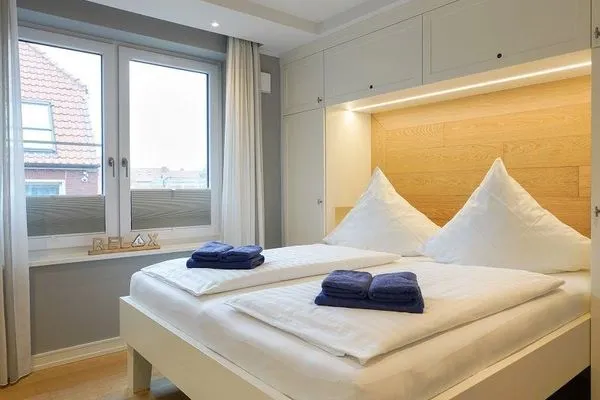 Schlafzimmer Achterhus Ferienwohnung Wattwurm