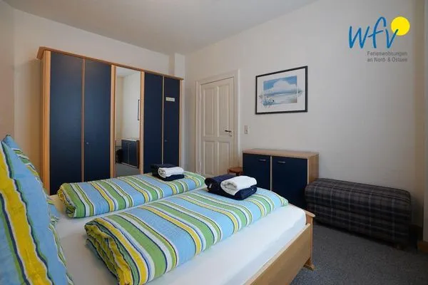 Schlafzimmer Logirhaus Doyen Ferienwohnung Neuwerk