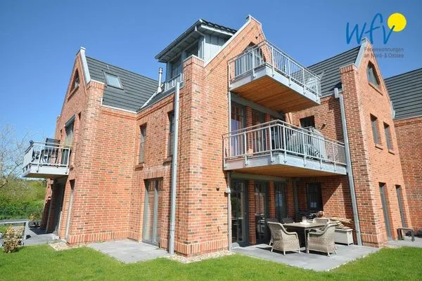  Bootshaus in den Dünen - 1 Ferienwohnung "Unter Fischen"