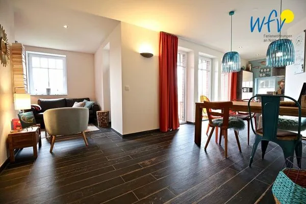 Wohnzimmer Bootshaus in den Dünen - 1 Ferienwohnung "Unter Fischen"