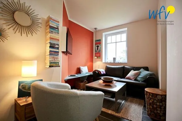 Wohnzimmer Bootshaus in den Dünen - 1 Ferienwohnung "Unter Fischen"