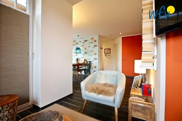 Wohnzimmer Bootshaus in den Dünen - 1 Ferienwohnung "Unter Fischen"