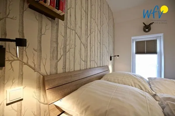 Schlafzimmer Bootshaus in den Dünen - 1 Ferienwohnung "Unter Fischen"