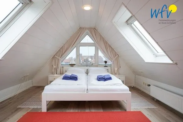 Schlafzimmer Juist Zauber - Haus 2 Ferienwohnung Caprasse