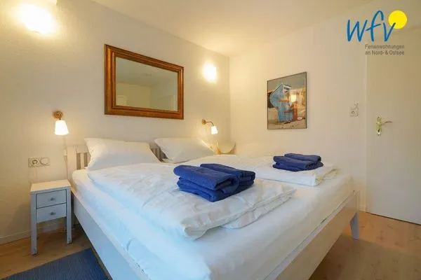 Schlafzimmer Juist Zauber - Haus 2 Ferienwohnung Caprasse