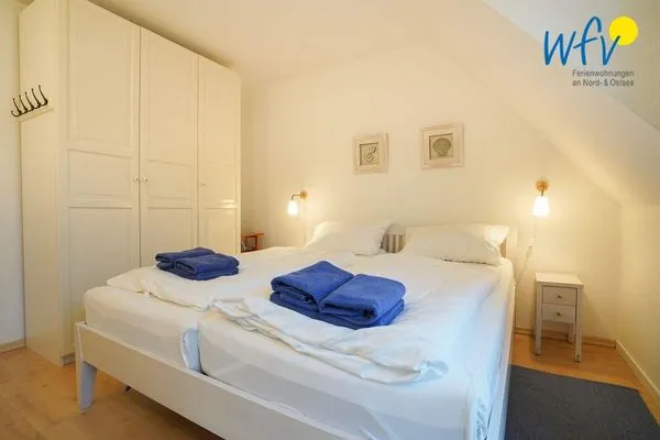 Schlafzimmer Juist Zauber - Haus 2 Ferienwohnung Caprasse
