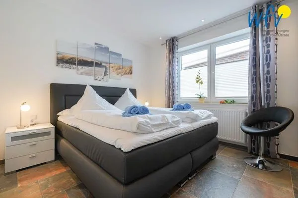 Schlafzimmer Haus Wilhelmshöhe Ferienwohnung Meeresblick